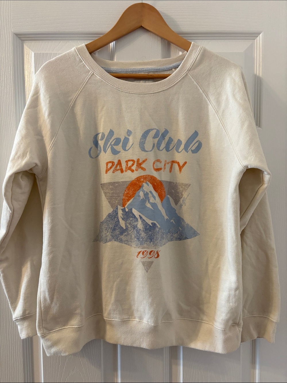 Wallflower Cream Crewneck Sweatshirt with Blue and Orange Ski Graphic